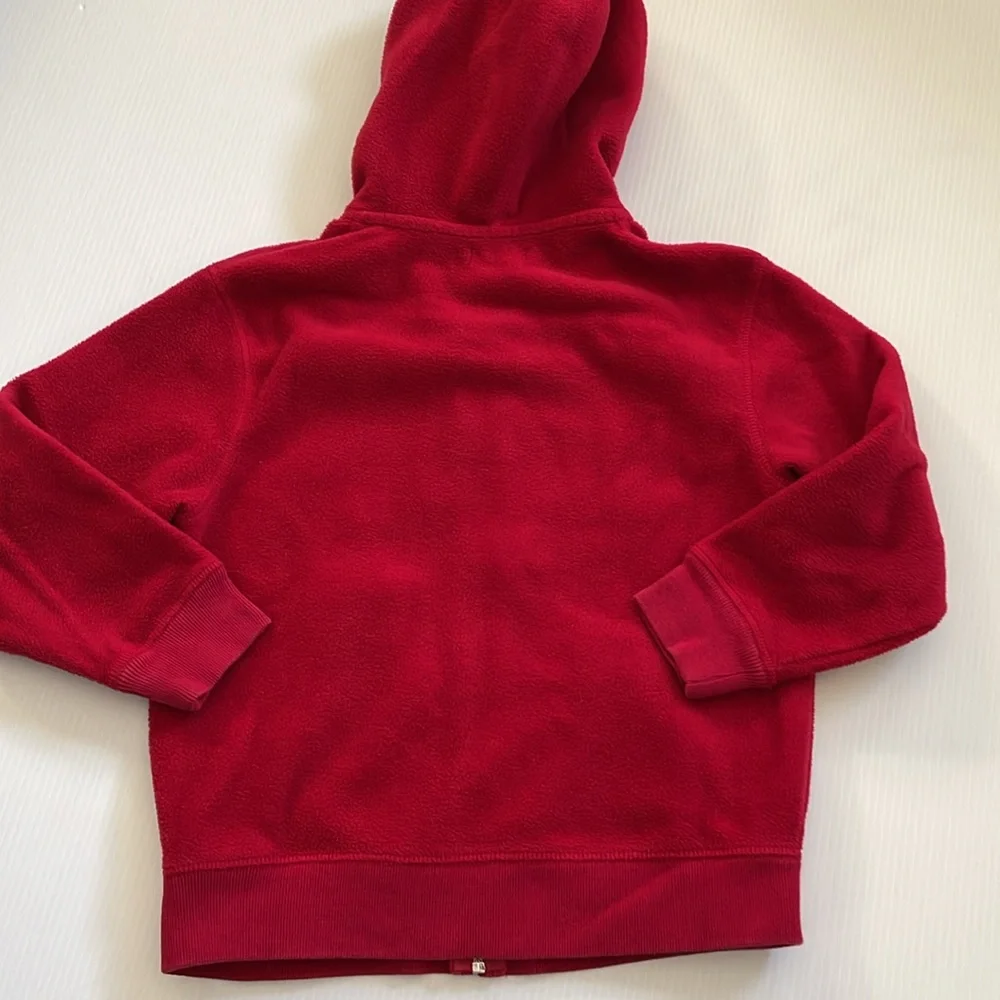 GapKids red hooded, full zip sweatshirt with gray, blue & white GAP.  Size small
